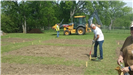 Man Clearing a Garden Plot