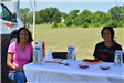 Two Women Sitting at a Booth