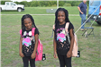 Two Girls Wearing Backpacks