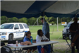 Volunteers Sitting at a Table