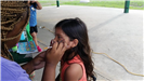 Young Girl Getting Her Face Painted