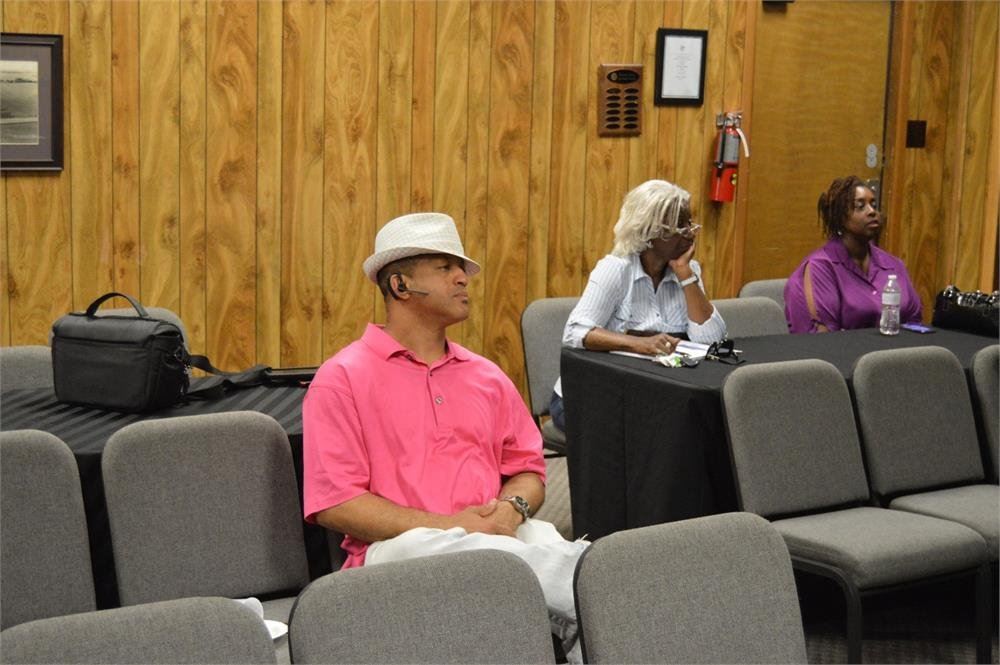 Citizens Listening to Police Officers Speak