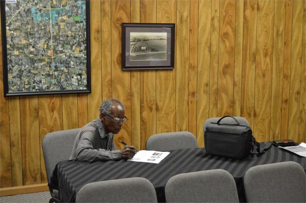 Man Filling Out a Form