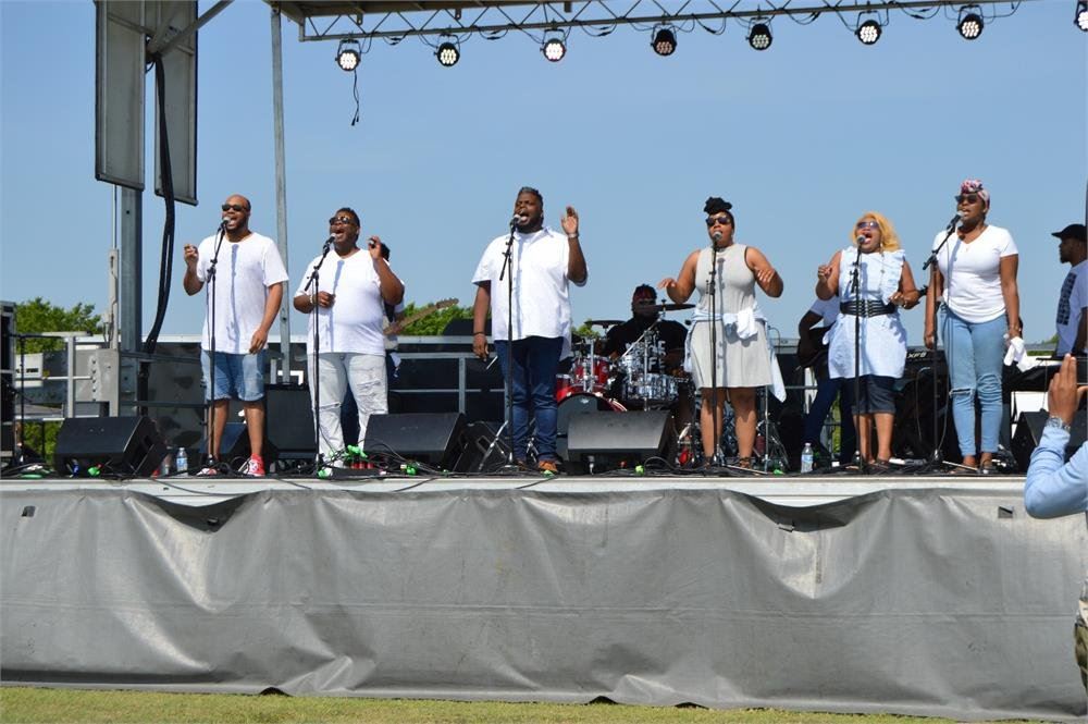 Six People Singing Together