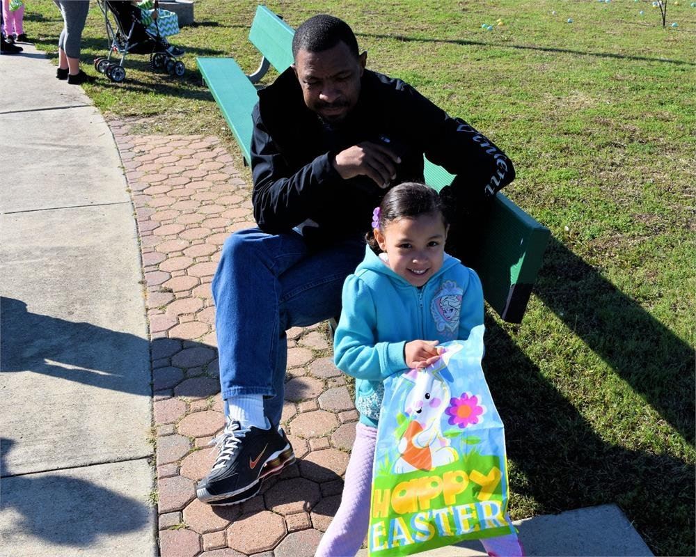 Man and Child Sitting Together