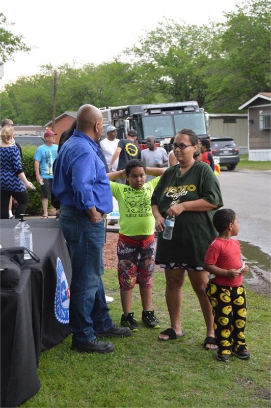Family Talking with City Council Members