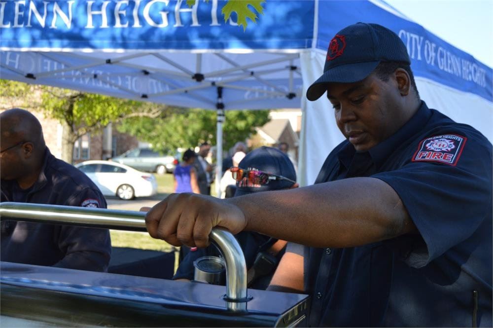 Firefighter Grilling Food
