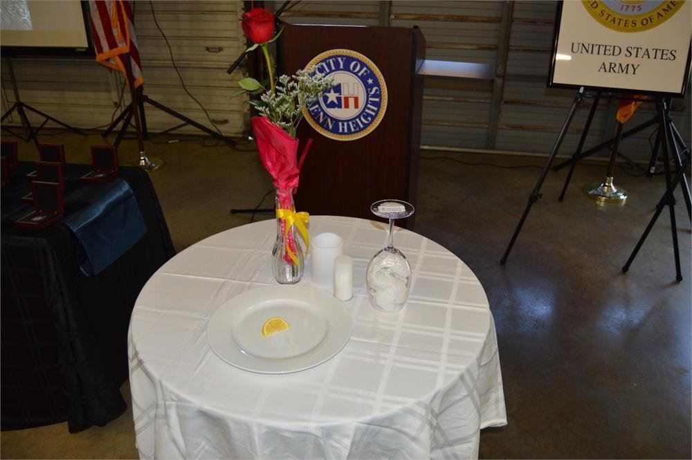Flower and Place Setting on a Small Table