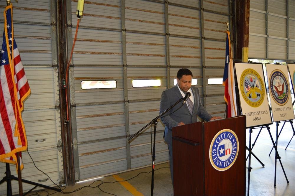 Man Speaking at a Podium