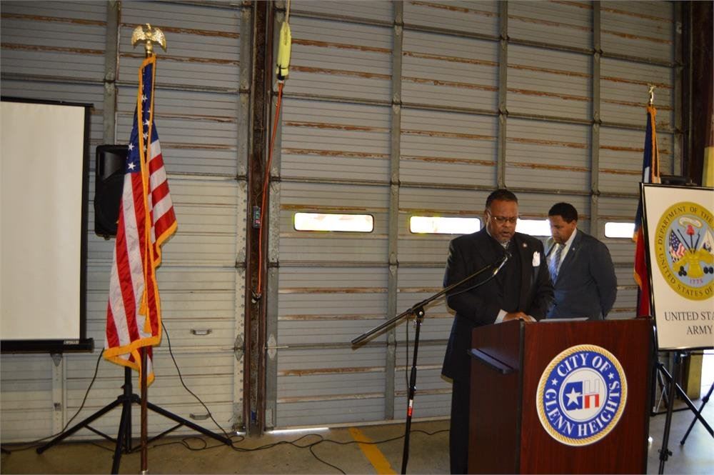 Man Speaking into a Microphone