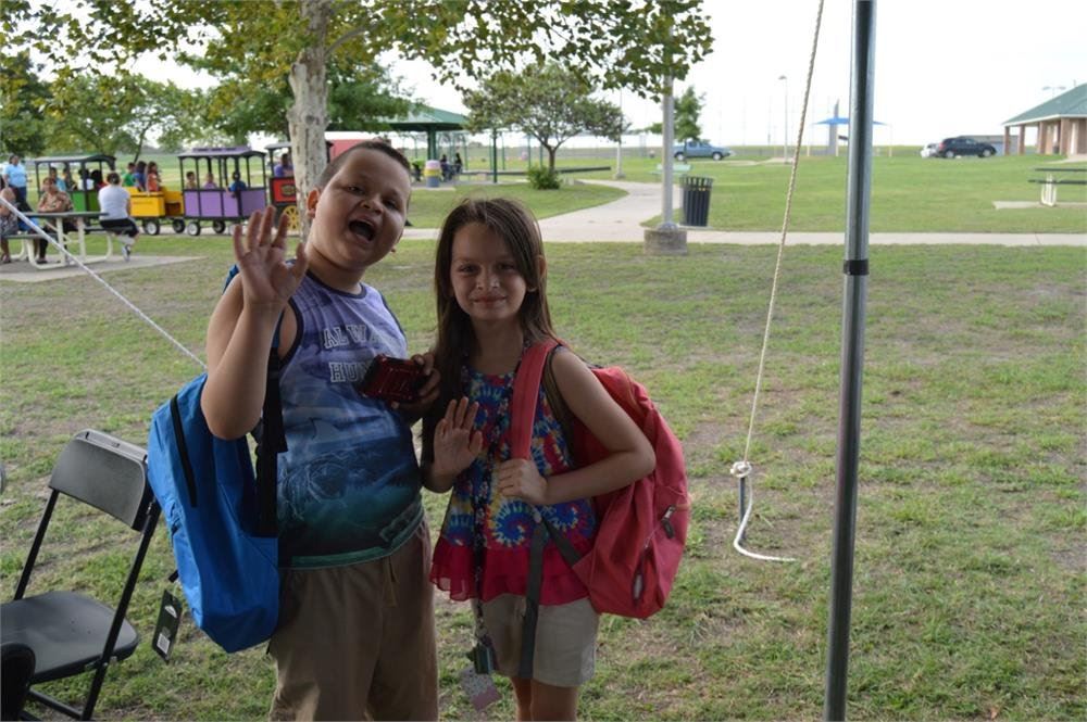 Two Kids Wearing Backpacks