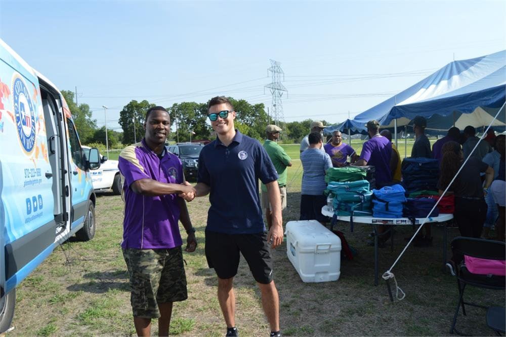 Two Young Men Shaking Hands