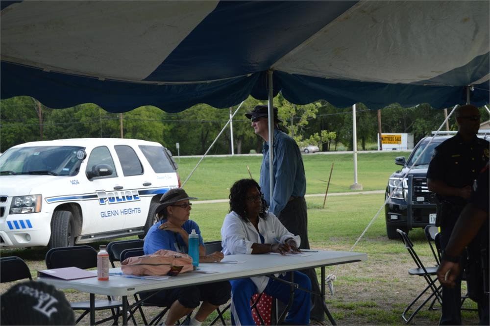 Volunteers Sitting at a Table