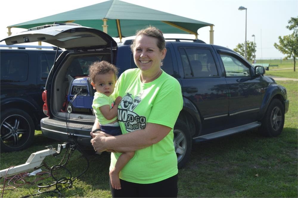 Woman Holding a Small Girl