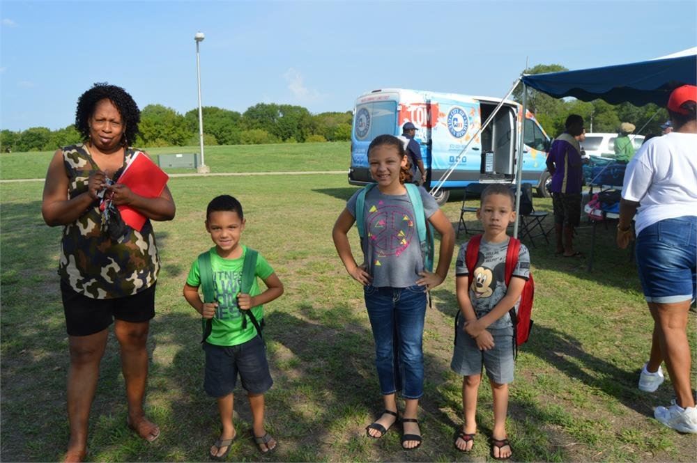 Woman Standing with Kids
