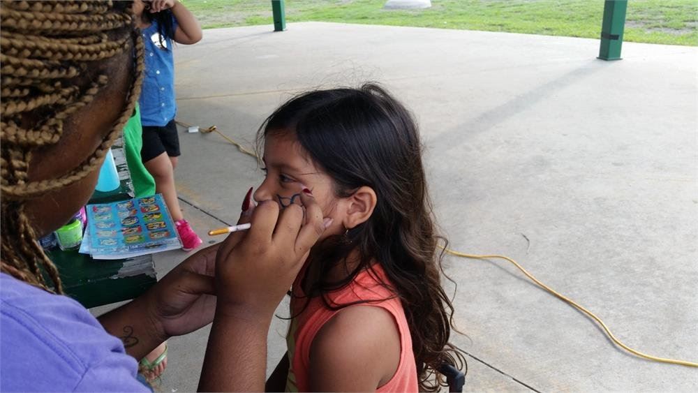 Young Girl Getting Her Face Painted